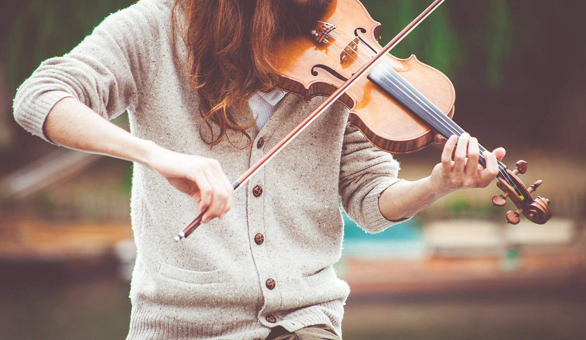 Violinist playing outdoors