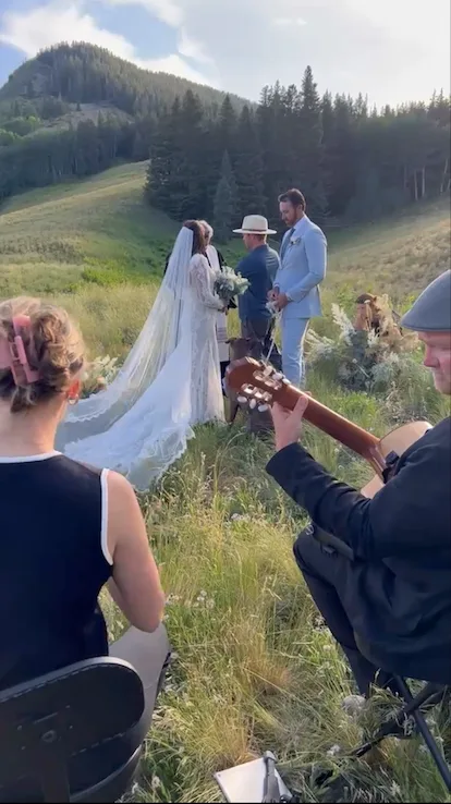 A mountain wedding ceremony with the duo playing live strings